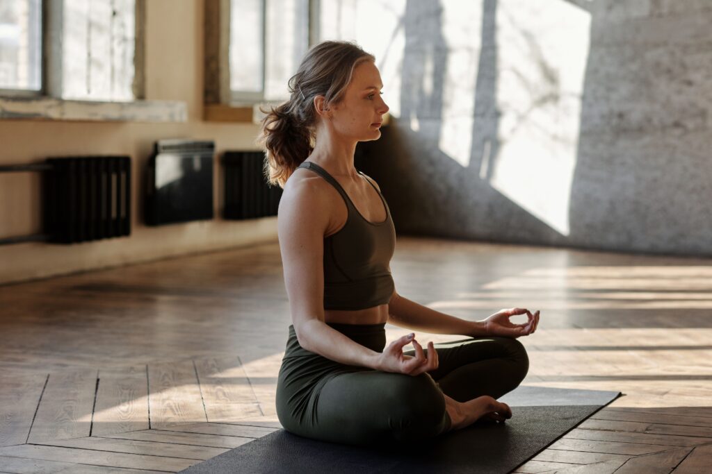 a women doing meditation