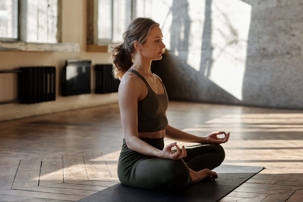 women practicing yoga and mindfulness