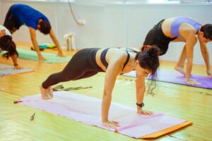 a group of people doing yoga